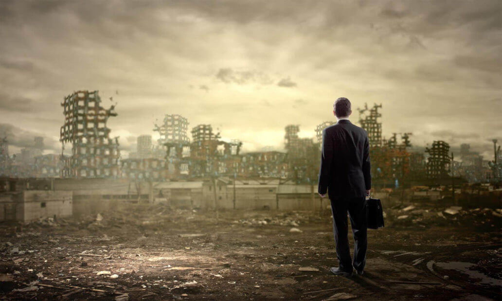 Man standing in ruins
