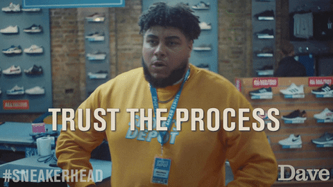 A person is working at a shoe store, telling a customer to "trust the process." Obviously they're talking about the process of how claims work.